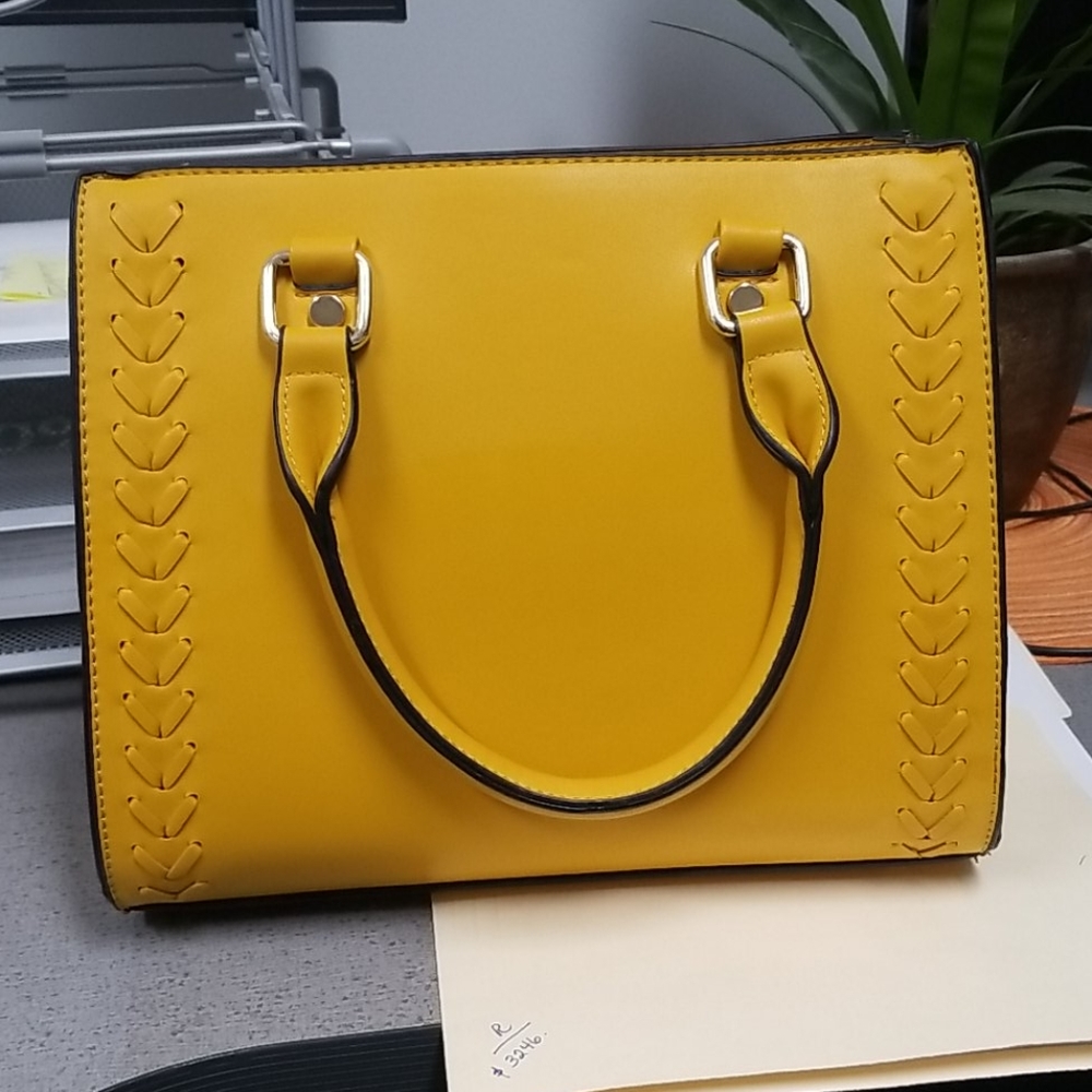 Yellow /mustard hand bag , brand new no tags